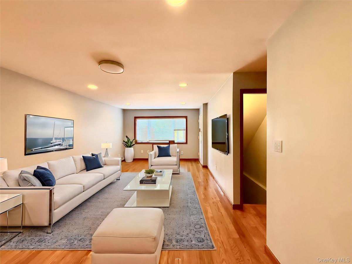 Recessed and flush-mount ceiling lighting illuminates the space
