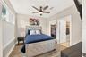 First floor bedroom with en suite bathroom and walk in closet