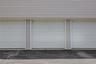 Garage is second to the right end. Separate storage space available behind garage.