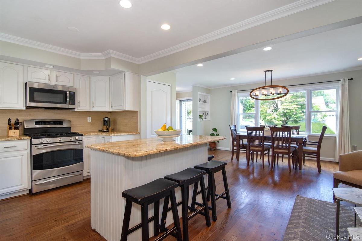 Dining, kitchen and living area