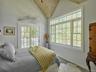 Carpeted bedroom featuring access to exterior, lofted ceiling, and wooden ceiling
