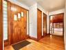 Front Door, foyer, door into garage and hall to living room