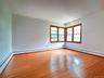 Primary Bedroom with lovely hard wood floor