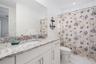 2nd ensuite bath with granite and tub/shower