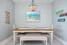 dining area with oyster chandelier