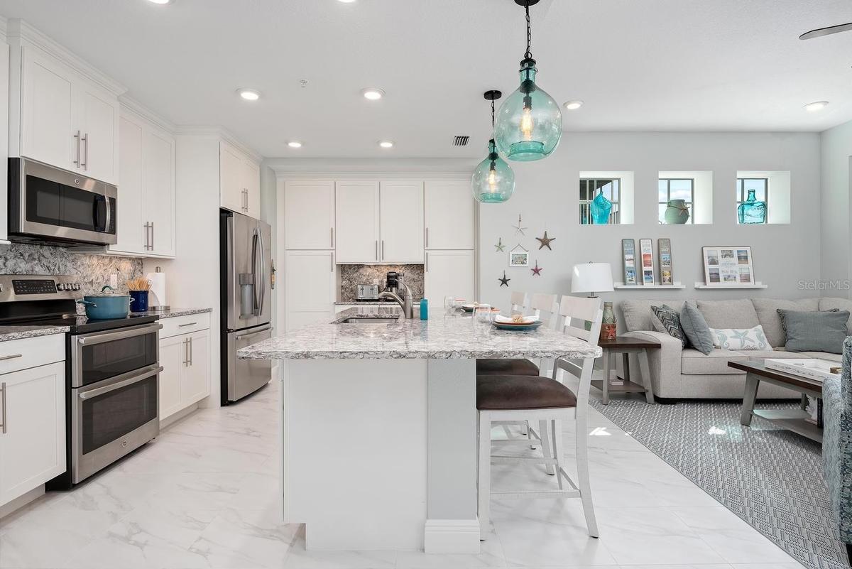 craftsman style kitchen with granite and large island
