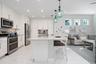 craftsman style kitchen with granite and large island