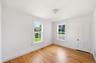 First floor bedroom off kitchen