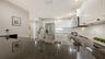 Black Granite CountersWhite Tile Backsplash