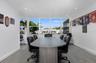 The community has 2 clubhouses. All have been renovated. This is one of the many areas where you can hold meetings. This Clubhouse is right on the wat