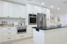 Perfect place to cook and entertain. The window over the Kitchen Sink brings in light.