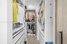 CUSTOM WALK IN CLOSET WITH CUSTOM BUILT INS