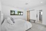 LARGE MAIN BEDROOM WITH SLIDING BARN DOOR