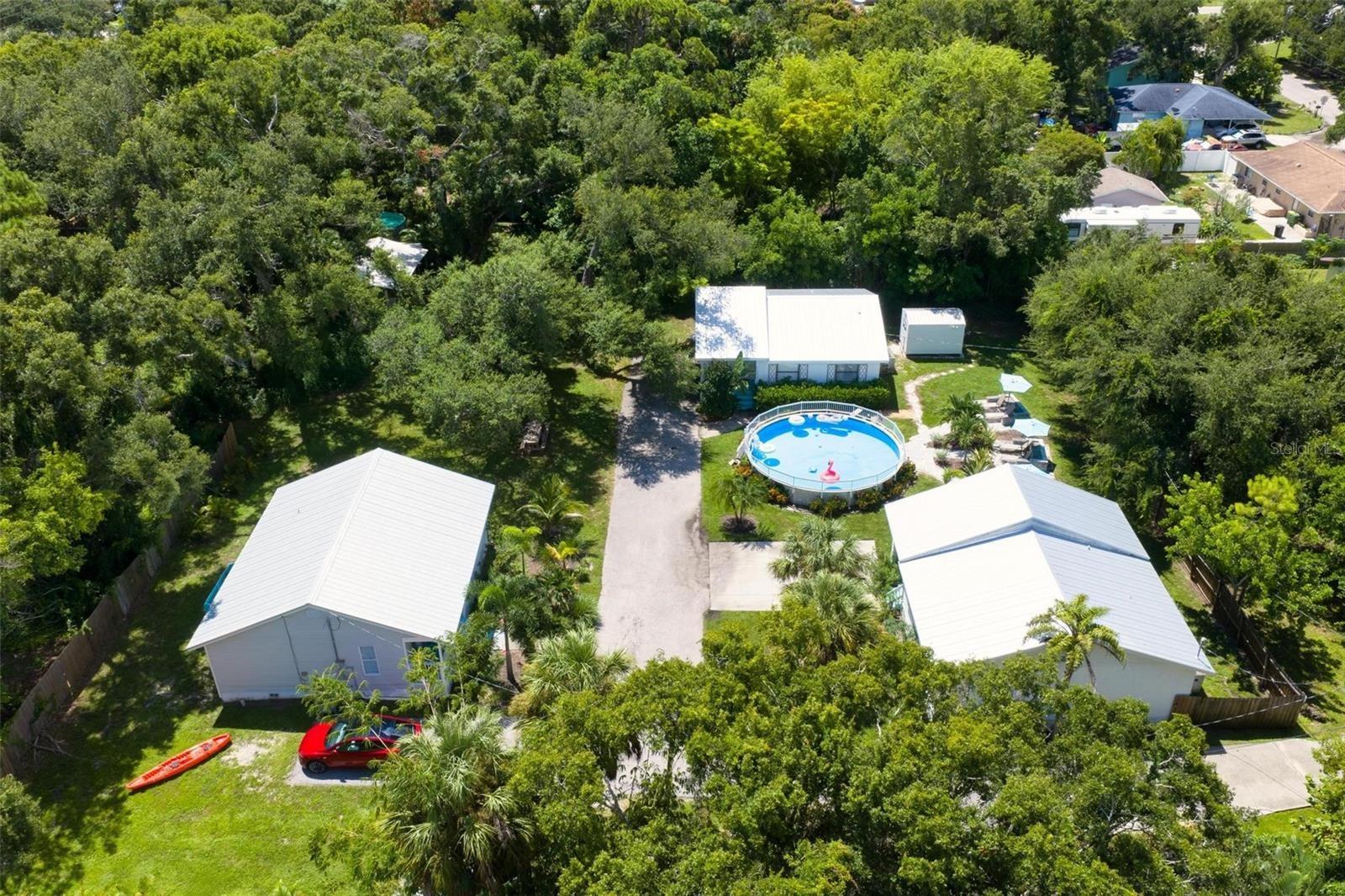 3 Homes 1 large Lot