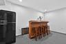 Bar and fridge included