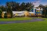 Peaceful country setting featuring a single-family residence on over 24 acres of private, usable land with mature surroundings and endless potential.