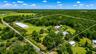 Expansive outdoor space surrounded by natural Florida landscape, offering privacy, open land use, and endless potential for future improvements or exp