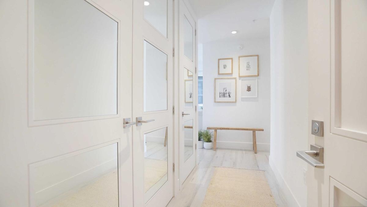 Clean architectural lines and a restrained material palette define the interior approach.