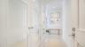 Clean architectural lines and a restrained material palette define the interior approach.