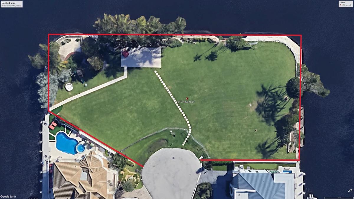 Aerial view of 870 Havana Drive illustrating the approximate property boundaries of Lots 13 & 14 and the exceptional waterfront configuration with ext