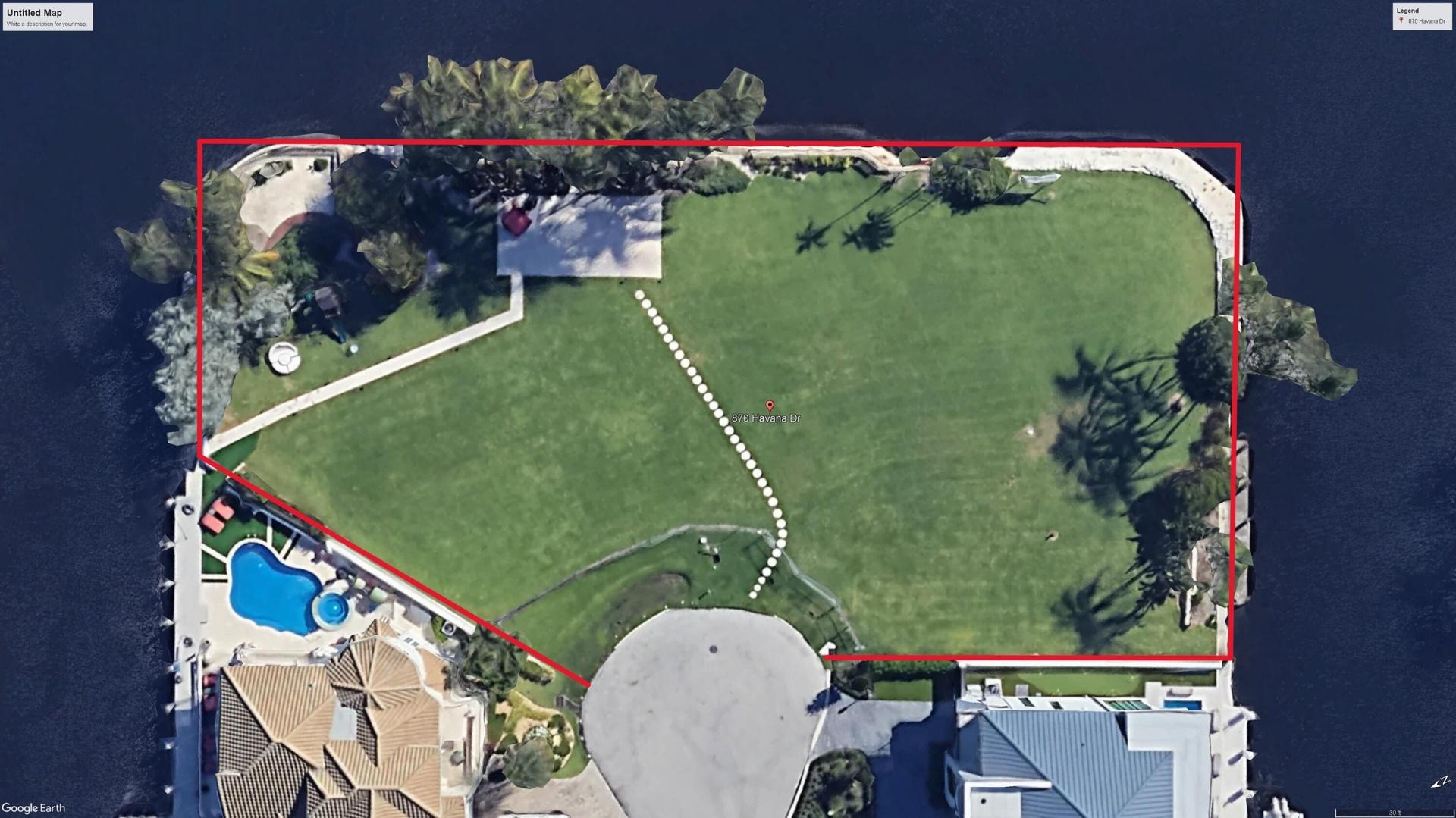 Aerial view of 870 Havana Drive illustrating the approximate property boundaries of Lots 13 & 14 and the exceptional waterfront configuration with ext