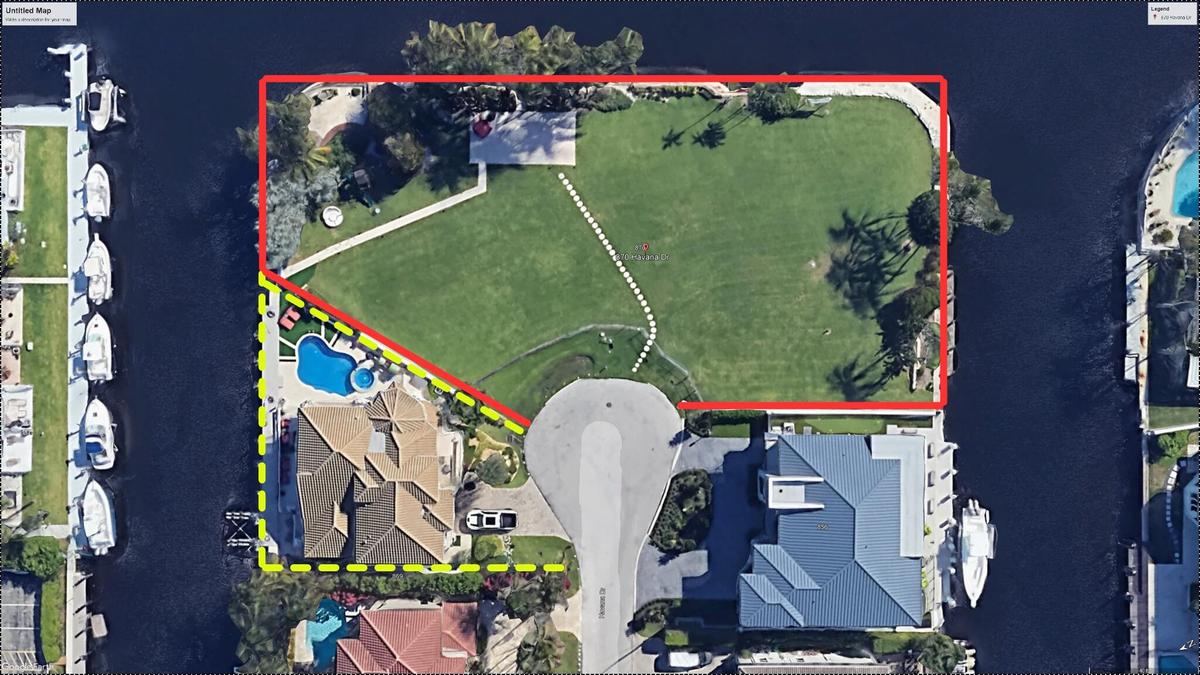 Aerial view of 870 Havana Drive with adjacent 857 Havana Drive residence, illustrating the potential combined three-lot waterfront property with exten