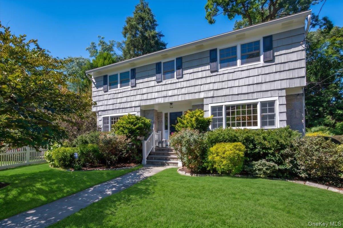 Welcome to 127 Harmon Avenue, a beautifully updated center hall Colonial where classic architecture, a highly functional layout and exceptional conven