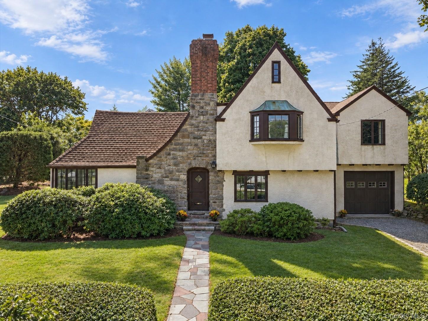 Classic Tudor charm meets an easy, flexible layout in this character-filled Harbor Heights home.