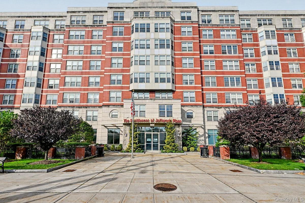 300 Mamaroneck Ave side of the building. Brick facade,
