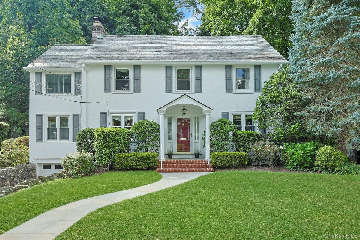 Gracious 1925 classic Center Hall Colonial in a coveted Greenacres location, just a half-mile walk to Metro-North, shops and restaurants.