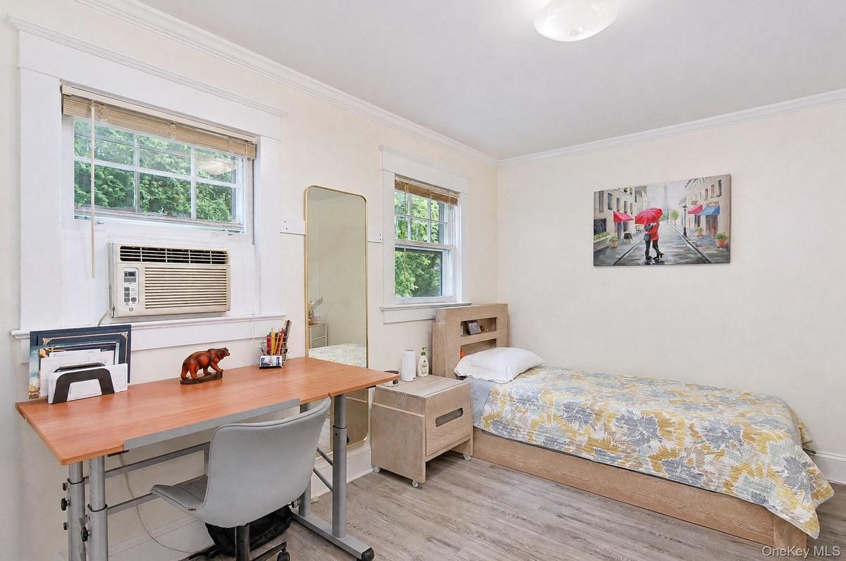 Main floor bedroom currently used as an office.