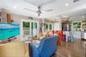 Open-concept interior featuring wood-finish flooring, recessed lighting, a modern ceiling fan, and sliding glass doors with exterior access