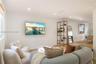Neutral interior space featuring smooth walls, recessed ceiling lighting, and wood-finish flooring