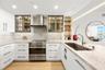Professionally remodeled gourmet Kitchen with top of the line Fisher & Paykel appliances