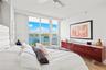 Master Bedroom with beautiful downtown Miami skyline views + Star Island