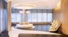 Expansive room featuring a curved wood-paneled wall, recessed circular ceiling lighting, floor-to-ceiling windows with integrated drapery, and a polis