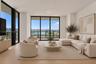 Floor-to-ceiling windows, wood-finish flooring, black window frames, and private balcony access with panoramic outdoor scenery