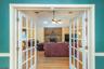 Doors lead to family room