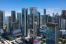High-rise urban towers featuring glass facades and metal structural elements
