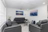 Neutral-toned tile flooring, crown molding, and recessed lighting