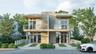 Modern two-story architectural design featuring a natural stone facade, dual upper-level balconies with glass railings, floor-to-ceiling windows, and 