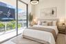 Floor-to-ceiling sliding glass doors, tile flooring, glass-paneled balcony railing, and modern circular pendant lighting