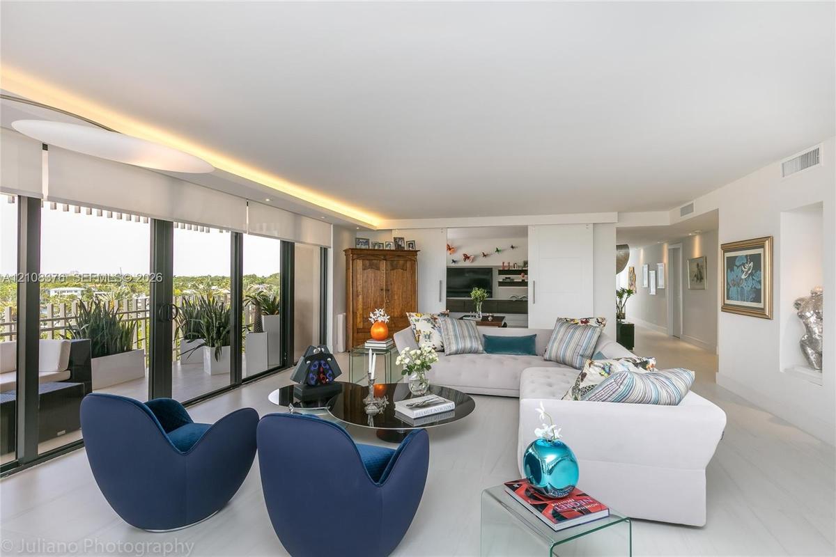 Living Room is bright and spacious and offers a magnificent Bay and Landscaping view