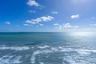 Direct oceanfront exposure with panoramic water and horizon scenery