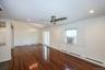 Spare room featuring baseboard heating, dark wood finished floors, recessed lighting, ornamental molding, and ceiling fan