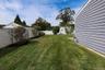 View of fenced backyard
