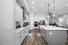 12 Foot Ceilings and a 9 foot Island creates a truly Grand Kitchen