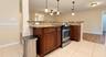 island in kitchen with granite counters