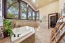 2nd and 3rd bath-jetted tub and large open shower