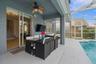 Your outdoor oasis offers a large covered lanai and a screened in pool.